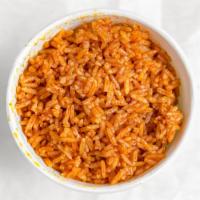 Jollof Rice · Vegan, gluten free. Rice cooked in tomato broth. Vegan.  gluten free.