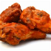 Buffalo Chicken Wings · Fresh wings crisp to perfection tossed in tangy buffalo sauce.