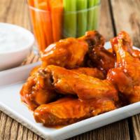 Honey Mustard Chicken Wings · Fresh wings crisp to perfection tossed in bbq sauce.