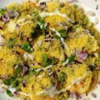 Papri Chaat · Savory crispy pastry, chickpeas, onions, sweet sauce, yogurt and spices
