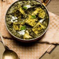 Palak Paneer · Cottage cheese squares in smooth delicious spinach gravy