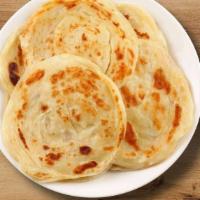 Plain Paratha · Available on weekend. Layerd flatbread with butter filling, cooked on a tawa(pan)