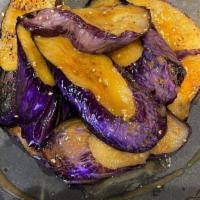 Eggplant Misoyaki · Vegetarian. Grilled eggplant with miso glaze, sesame, chives.