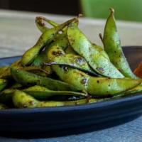 Grilled Edamame · Finished with truffle salt and touch of togarashi.