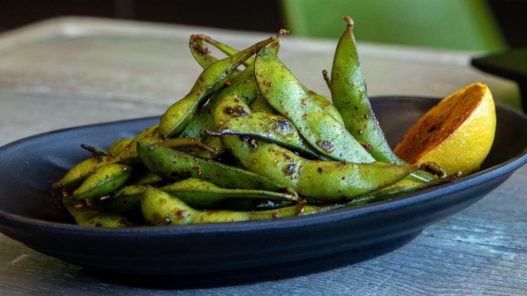 Grilled Edamame · Finished with truffle salt and touch of togarashi.