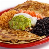 Nui Quesadilla · Two grilled flour tortillas, cheese, protein choice, guacamole, sour cream Pico and served w...