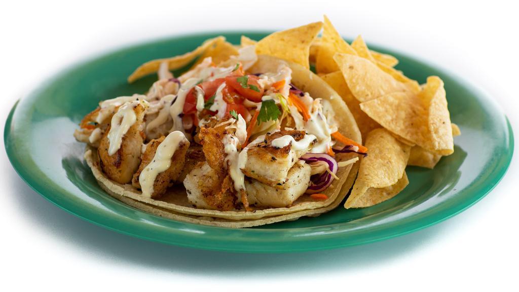 Grilled Fish (1) · Marinated grilled fish with cabbage & cilantro jalapeño sauce.