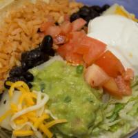 Maui Taco Vegetarian · Choice of beans w/ rice, potatoes, mixed greens, tomatoes & guacamole