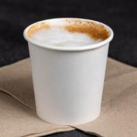 Macchiato · Espresso stained with a small dollop of foam.