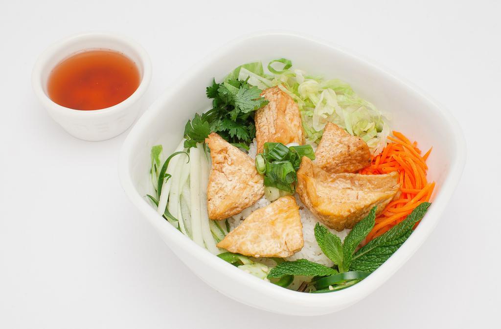 Tofu Rice · Tofu rice bowl comes with tomato, lettuce, pickle carrot & radish, cucumber, cilantro, jalapeno and fish / peanut sauce.
