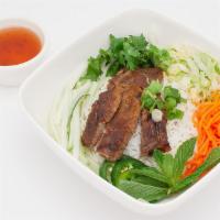 Grilled Pork Chop Vermicelli · Grilled pork chop vermicelli bowl comes with lettuce, beansprout, pickle carrot& radish, cuc...