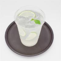 Fresh Lime Lemonade · Fresh squeezed lime juice lemonade with mint leaves.