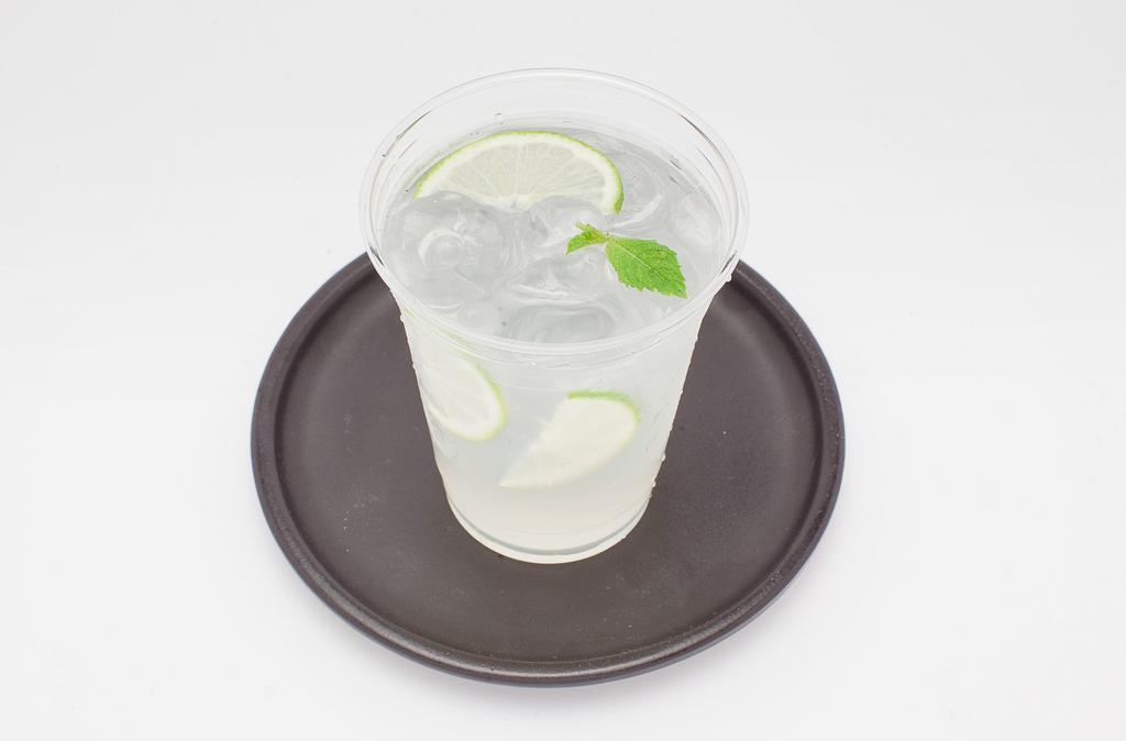 Fresh Lime Lemonade · Fresh squeezed lime juice lemonade with mint leaves.