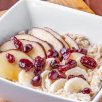 Old Fashioned Oatmeal · Old-fashioned oatmeal, banana, apple, cranberries & maple syrup