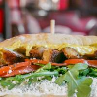 Curry Chicken Sandwich · Curry grilled chicken, spicy mayonnaise, plum tomatoes, goat cheese, arugula, honey on a toa...