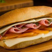 Italian Sandwich · Smoked ham, homemade pesto, provolone, tomatoes on a toasted ciabatta bread.