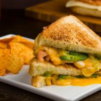 Fancy Grilled Cheese & Dorrito Bag · Melted Cheddar & Mozzarella with tomato & ripe avocado between two buttery grilled Bread
