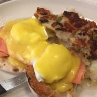 Lox Benedict  · Two poached eggs on an English muffin with lox topped with Hollandaise sauce.