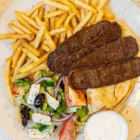 Souvlaki Platter · Served with Greek Salad & French Fries
