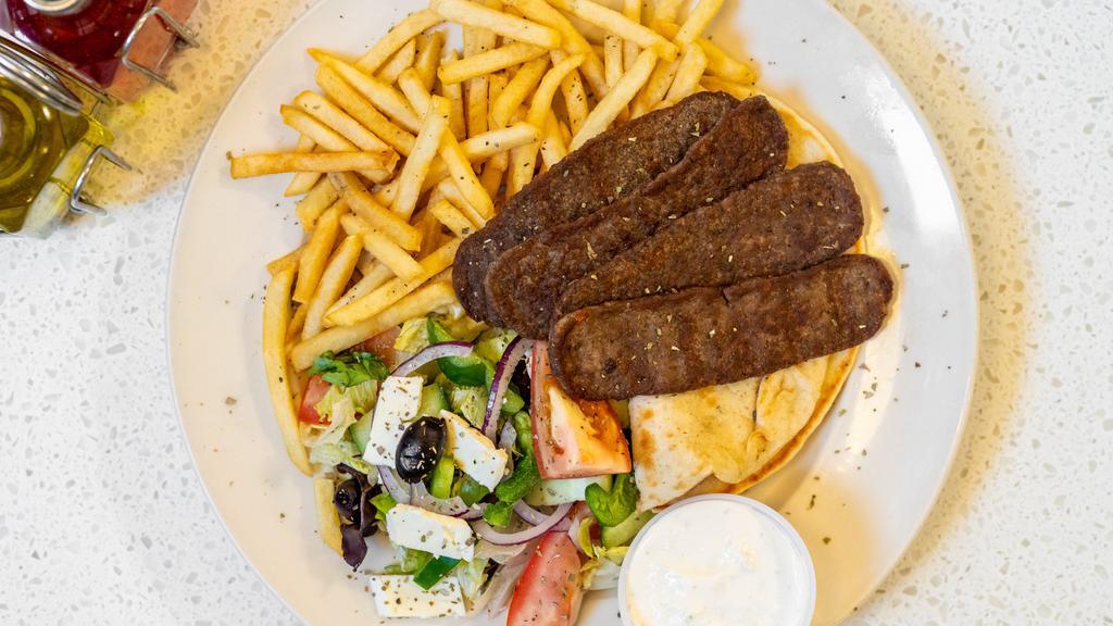 Souvlaki Platter · Served with Greek Salad & French Fries