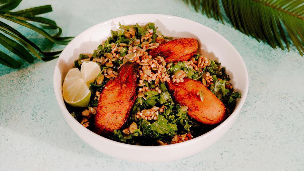 Plantain Salad · Citrus rubbed kale topped with buckwheat crunch and sweet plantains.