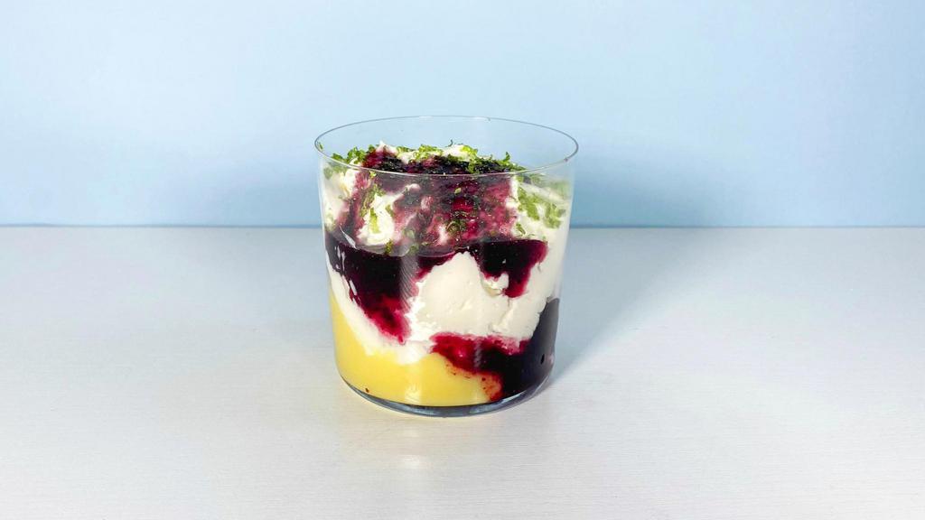 Berry Mess · This whipped creme fraiche is perfectly layered with fresh berries and creamy lemon curd.  Best stirred upon arrival for maximum flavor | Allergen: Milk, Egg