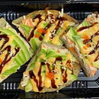 Spicy Crab Pizza · Crispy rice cake top with spicy crab avocado sesame seeds and spicy mayo.