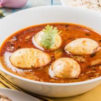 Classic Spicy Egg Curry · Soft boiled eggs cooked in spicy onion tomato gravy
