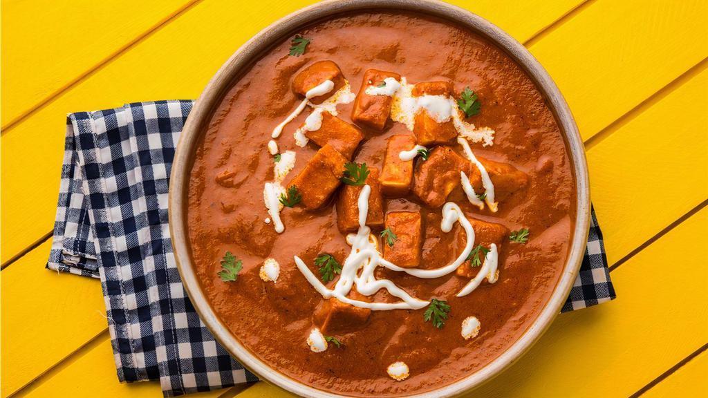 Creamy Paneer Butter Masala · Soft Paneer cubes cooked in smooth buttery and creamy tomato-based gravy