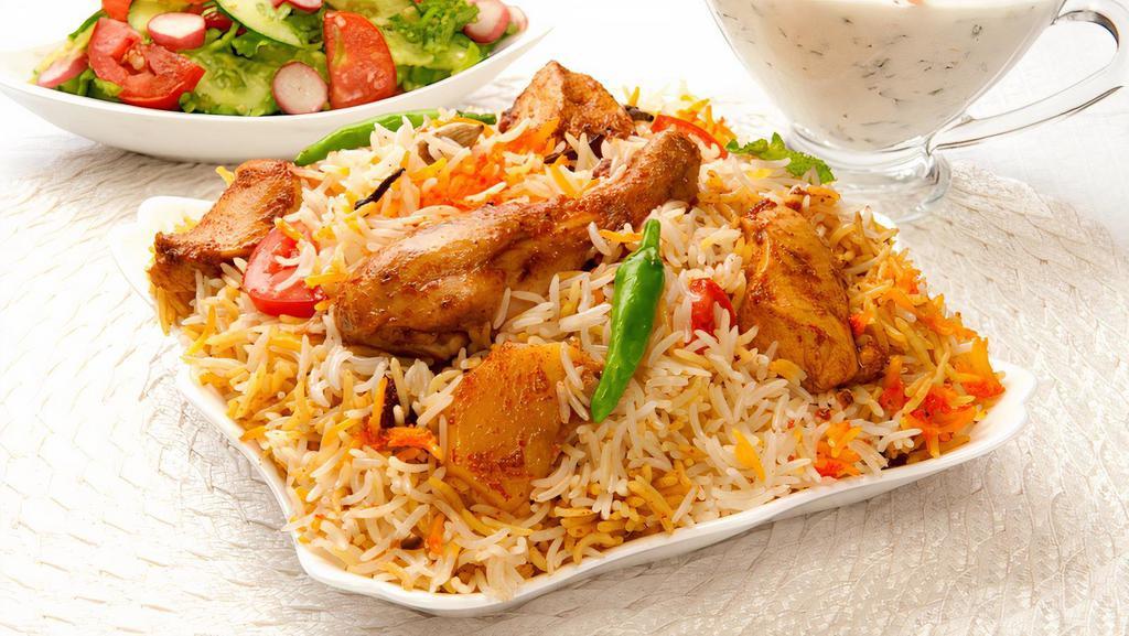 Tc'S Special Chicken Biryani · Spicy basmati rice cooked in biryani spices herbs and juicy chicken leg pieces