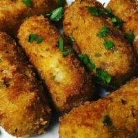 Potato Croquettes (6) · Fried potatoes with parsley, Parmesan and marinara.