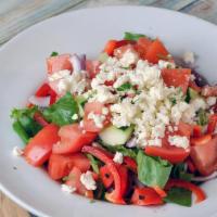 Greek · Romaine, peppers, onions, tomatoes, kalamata olives, cucumbers, Feta, and oil and vinegar dr...