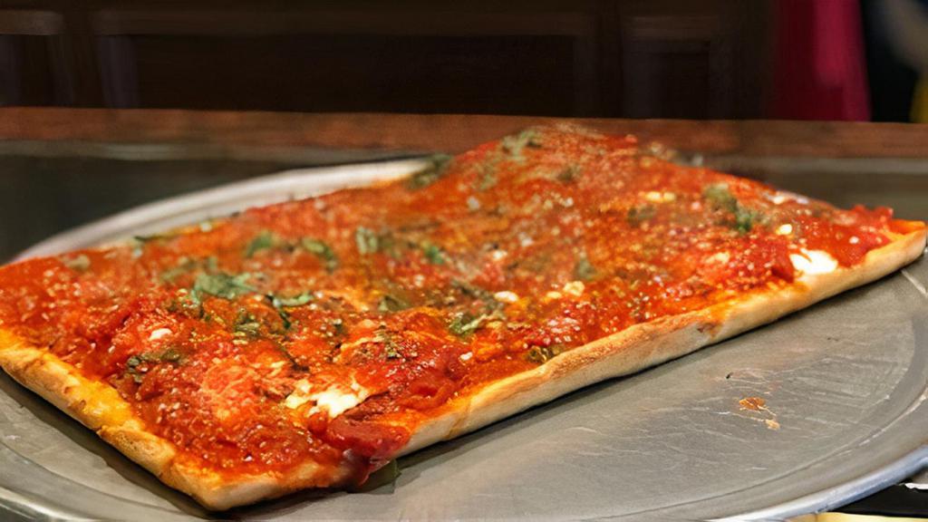 Marinara · Sicilian crust with San Marzano tomatoes, garlic, herbs, and grated Parmigiana, drizzled with extra virgin olive oil.