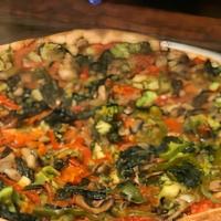 Vegan Pizza · Neapolitan crust with our cheese-less San Marzano tomato sauce, topped with fresh sautéed mu...
