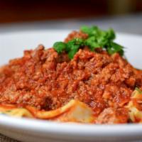Bolognese · Ground beef, veal, and pork in our hearty tomato sauce.