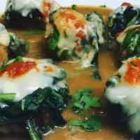 Shrimp Verde · Battered shrimp in our brown sauce with melted Provolone over spinach.