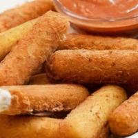 Mozzarella Sticks · Coated with a crisp garlic butter breading.
Served with house made marinara sauce