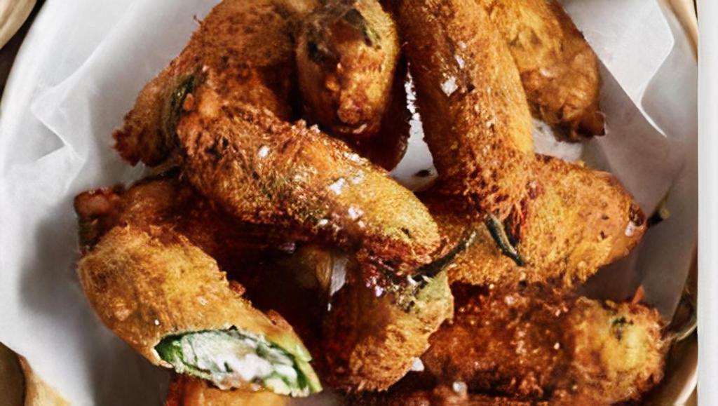 Jalapeno Poppers · Lightly Battered jalapenos stuffed with cheddar cheese
