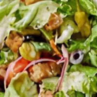 House Salad · Mixed greens, tomato, onion, croutons.