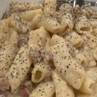 Rigatoni Alla Carbonara · Rigatoni pasta with egg, guanciale and Pecorino Romano cheese