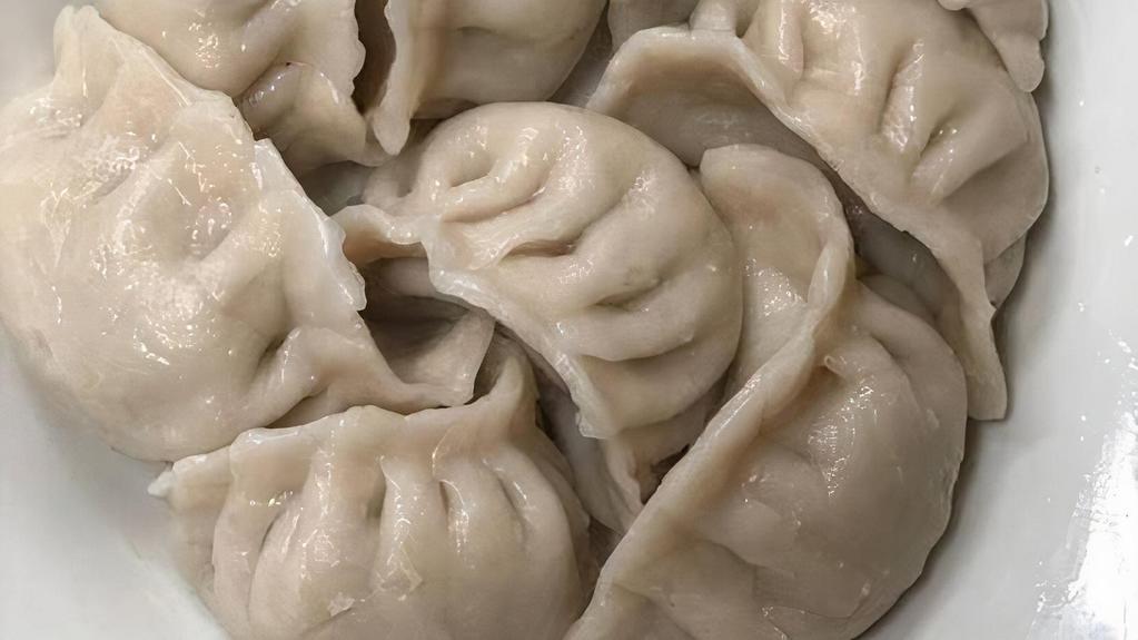 6 Steamed Pork Dumpling · 6 pieces.