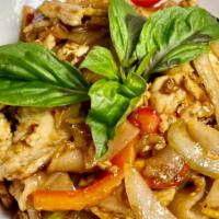 Spicy Drunken Noodles · Stir-fried flat rice noodles with egg, onions, garlic, fresh chili, bell peppers, cherry tom...