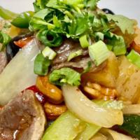 Pad Cashew Nut · Cashews nut, onions, mushrooms, carrots, scallions, bell peppers, pineapple chunks in chili ...