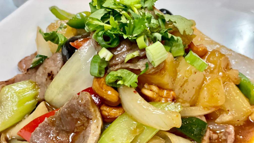 Pad Cashew Nut · Cashews nut, onions, mushrooms, carrots, scallions, bell peppers, pineapple chunks in chili paste brown sauce.