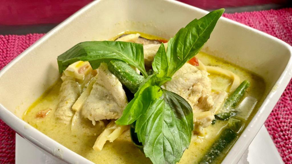 Green Curry · Green chili paste with bamboo shoots eggplants, bell pepper, string beans, fresh basil simmered in coconut milk.