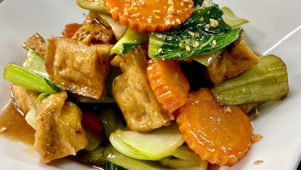 Bok Choy Tofu · Bok choy, carrot, and fried tofu in garlic brown sauce.
