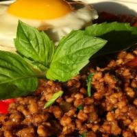 Basil Sauce Over Rice · Ground chicken or pork with chili basil sauce.