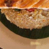 Salmon Fried Rice · Fried rice With egg, onions, bell peppers, fresh basil in chili garlic sauce topped with gri...
