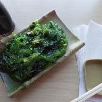 Seaweed Salad · Green seaweed and sesame seed marinated in sweet and sour sauce.