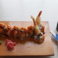 Sr24. Tiger Roll (8) · Tempura shrimp and crab inside topped with spicy crab.
